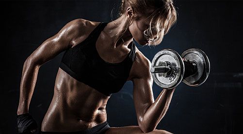 Woman Lifting Dumbbell